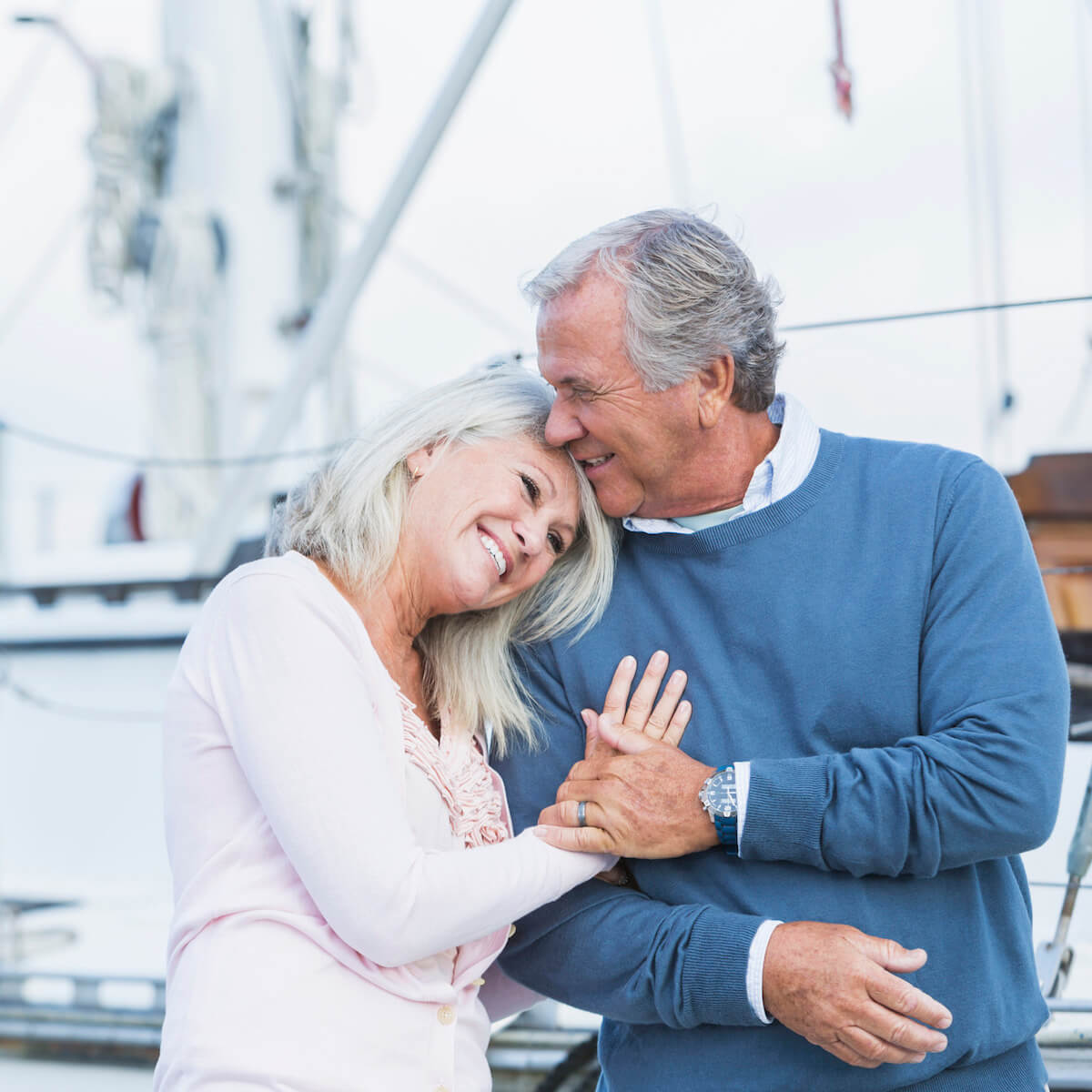 Affectionate mature couple at marina