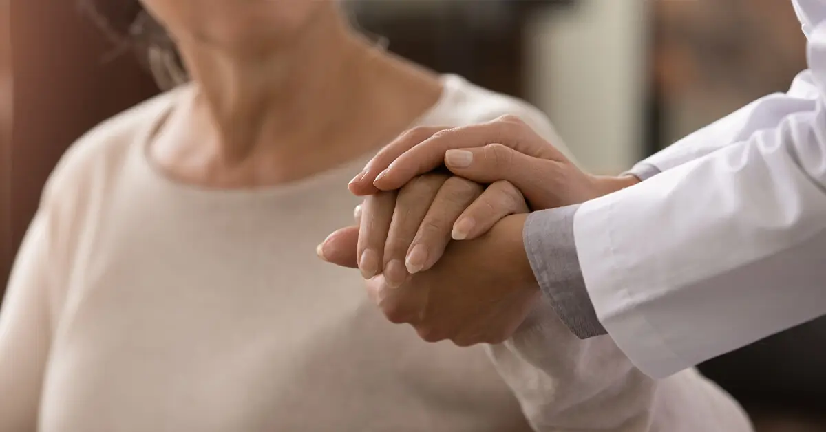 therapist comforting patient