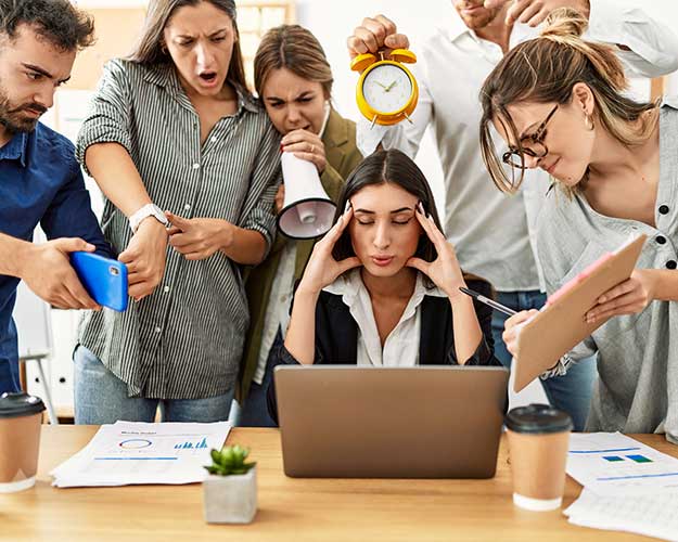 Woman in a crowded room with distractions